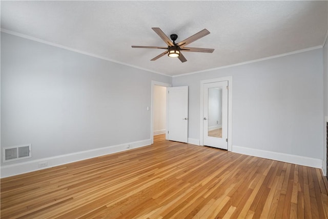 unfurnished bedroom featuring a textured ceiling, light wood-type flooring, ceiling fan, and ornamental molding