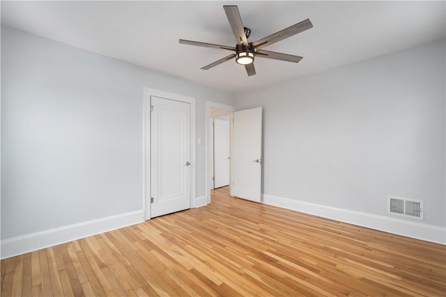 unfurnished room with ceiling fan and light hardwood / wood-style flooring