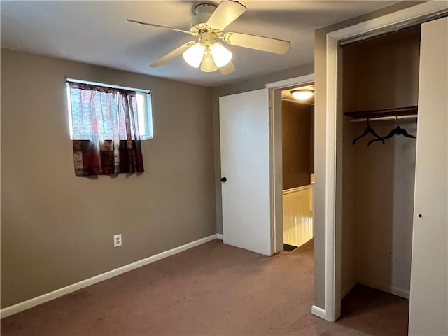 unfurnished bedroom featuring carpet flooring, ceiling fan, and a closet