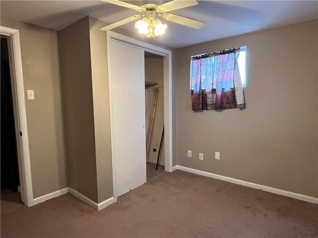 unfurnished bedroom with carpet flooring, a closet, and ceiling fan