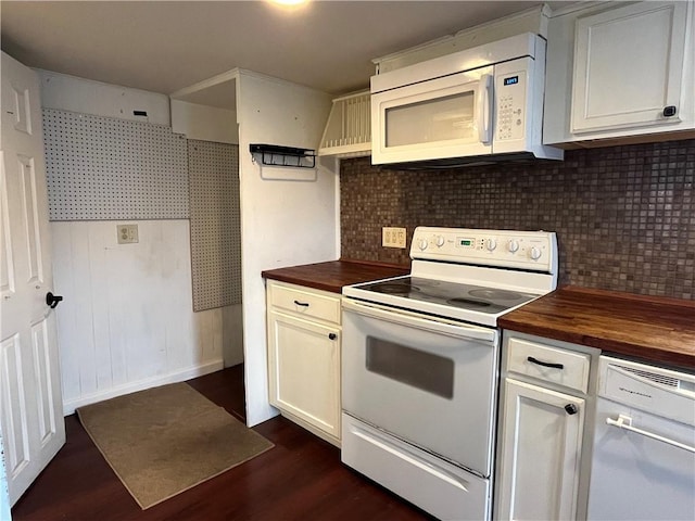 kitchen with dark hardwood / wood-style floors, white cabinetry, wood counters, and white appliances