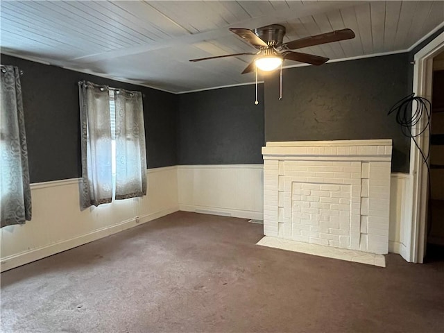 interior space featuring ceiling fan and wooden ceiling