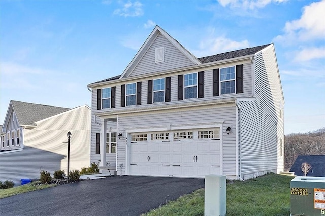 view of property featuring a garage