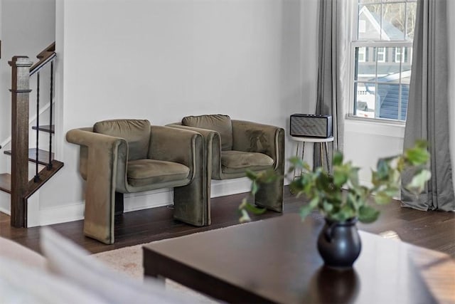 sitting room featuring dark wood-type flooring