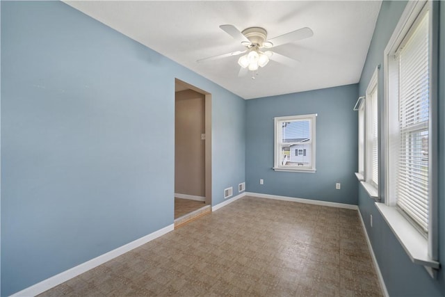 empty room with ceiling fan