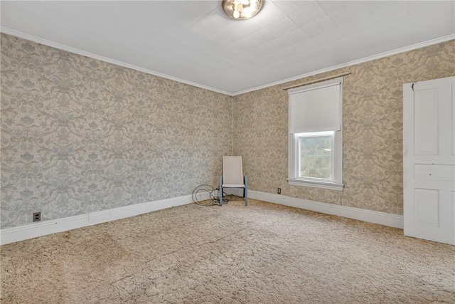 carpeted empty room with ornamental molding