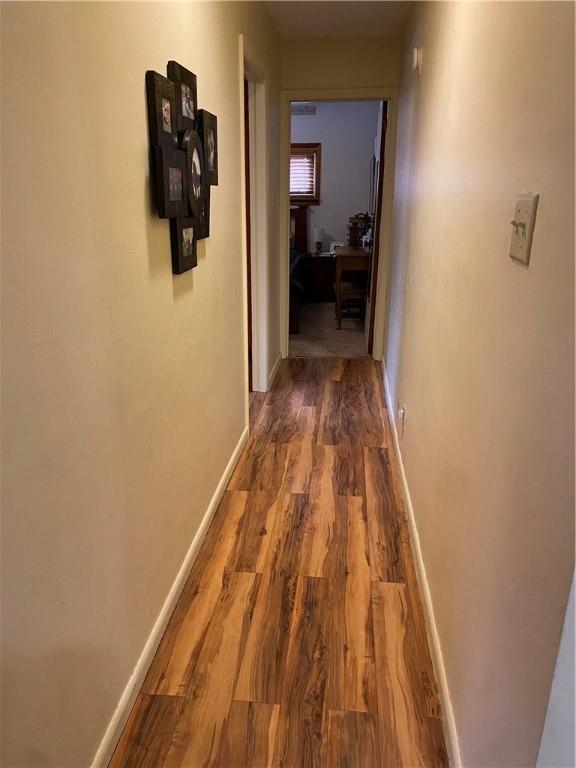 hall featuring wood-type flooring