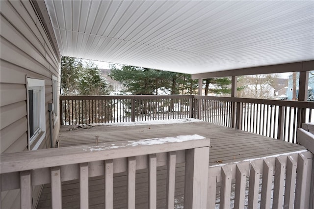 view of snow covered deck