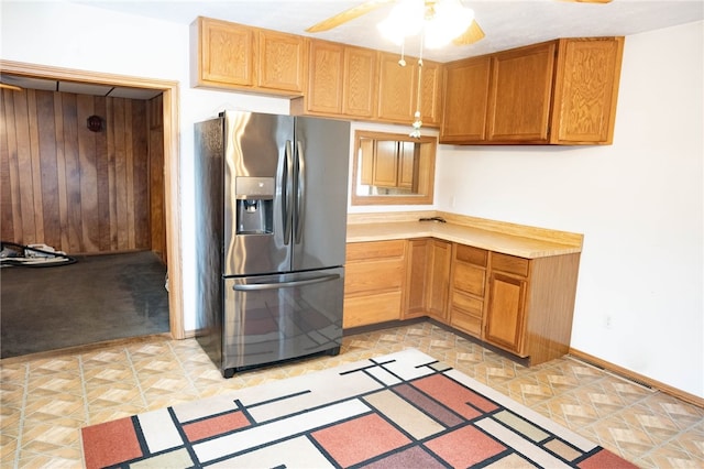 kitchen featuring stainless steel fridge and ceiling fan