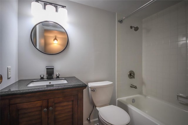 full bathroom with shower / washtub combination, vanity, and toilet