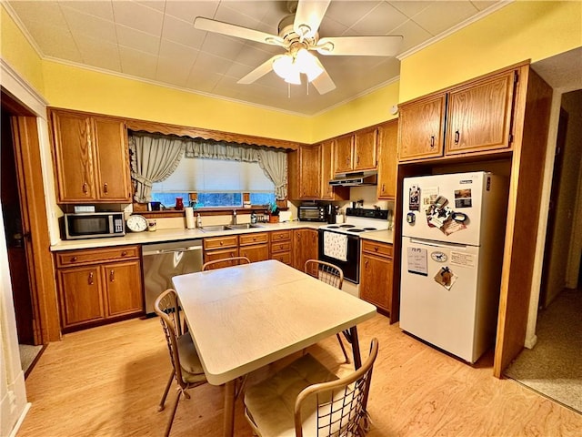 kitchen with sink, light hardwood / wood-style flooring, white appliances, and ornamental molding