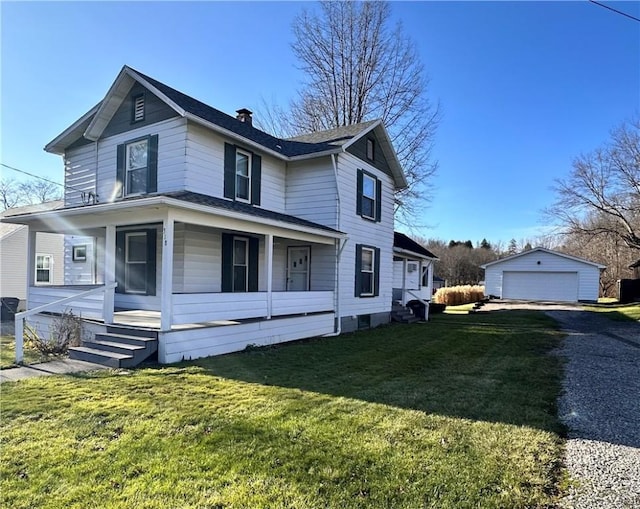 view of front of house with a porch, a garage, a front lawn, and an outdoor structure