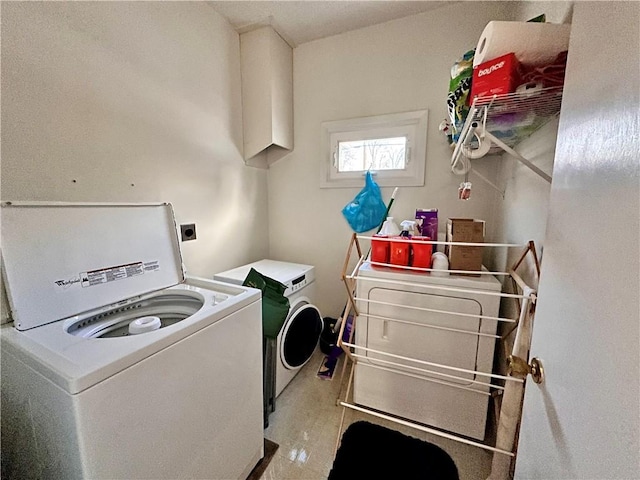 laundry area with independent washer and dryer