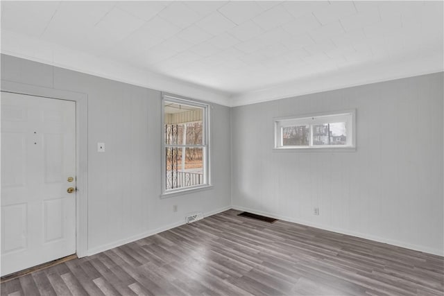 spare room featuring hardwood / wood-style flooring