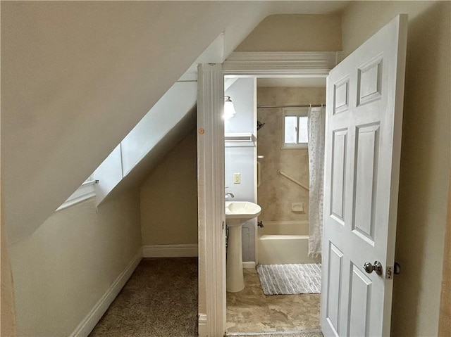 bonus room with vaulted ceiling