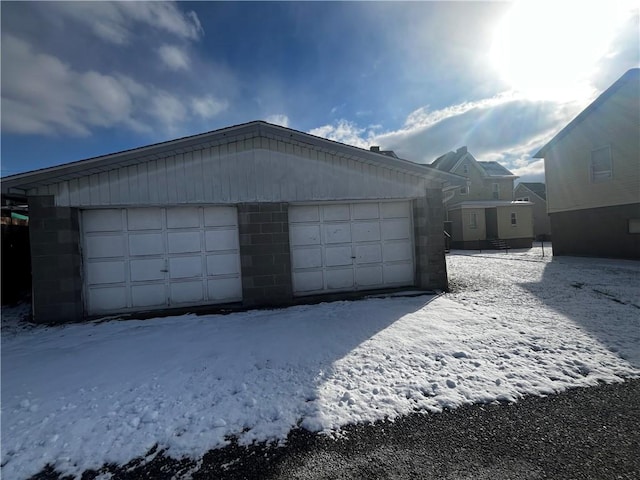 view of snow covered garage