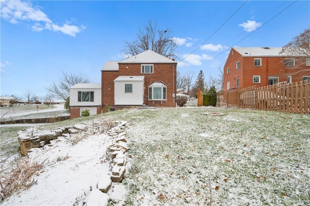 view of snow covered house