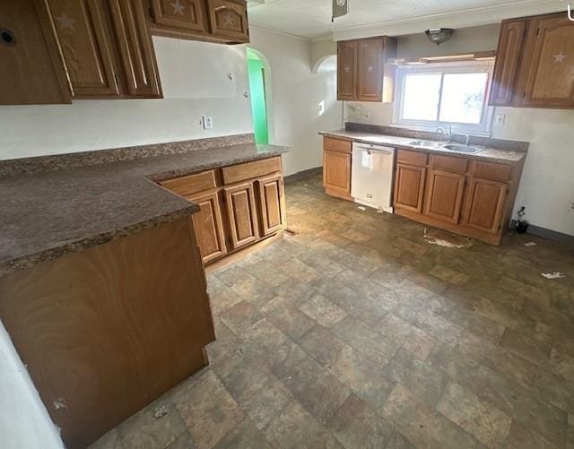 kitchen featuring stainless steel dishwasher, ceiling fan, ornamental molding, and sink