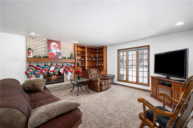 living room with a fireplace and carpet