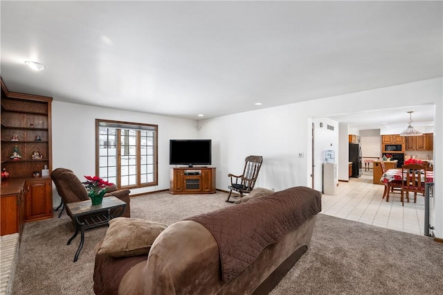 living room featuring light colored carpet