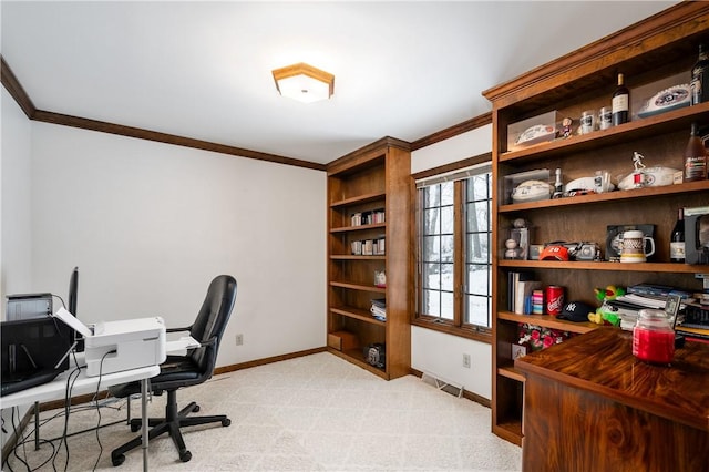 carpeted office space with crown molding