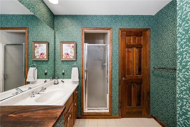 bathroom with vanity and walk in shower