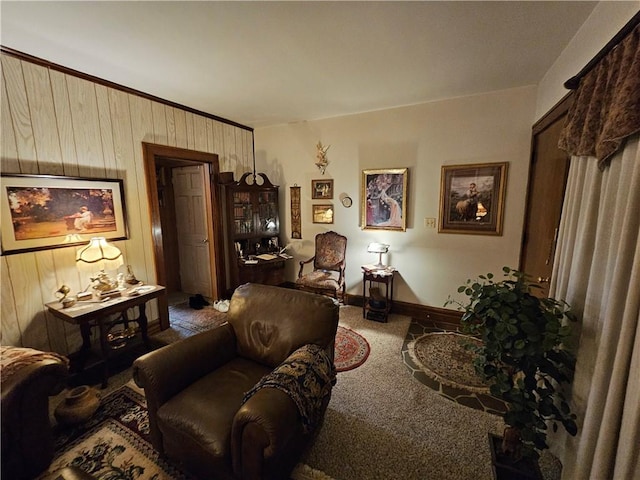 living area featuring wood walls and carpet floors