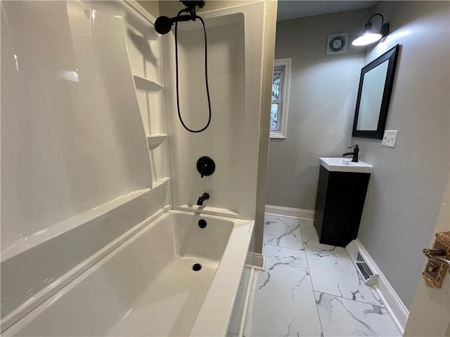 bathroom featuring vanity and shower / washtub combination