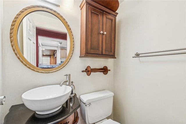 bathroom with sink and toilet