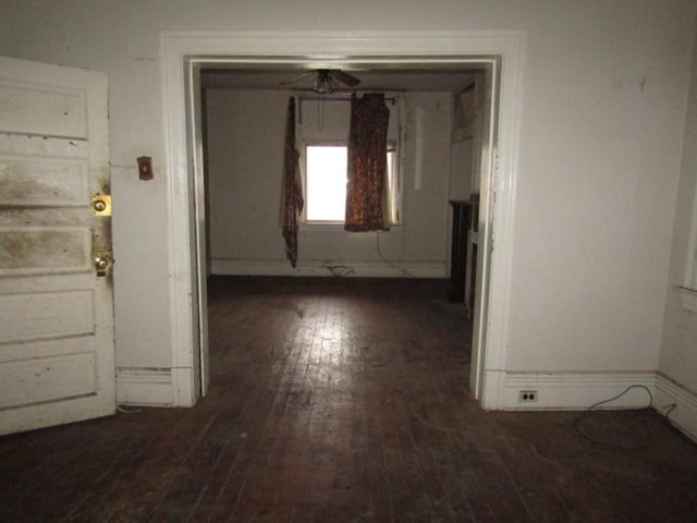 hall with dark hardwood / wood-style flooring