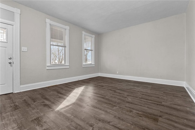 foyer entrance with dark hardwood / wood-style flooring