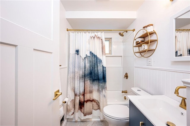 full bathroom featuring vanity, shower / bath combo, and toilet