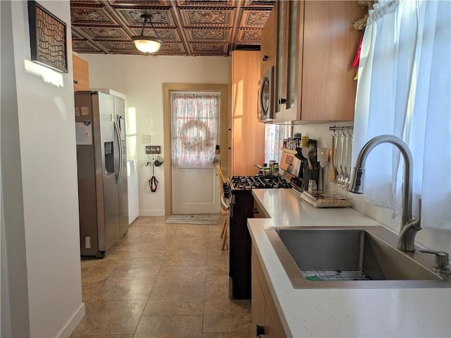 kitchen featuring sink and appliances with stainless steel finishes