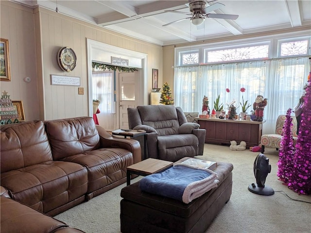 living room with coffered ceiling, crown molding, ceiling fan, beamed ceiling, and carpet floors