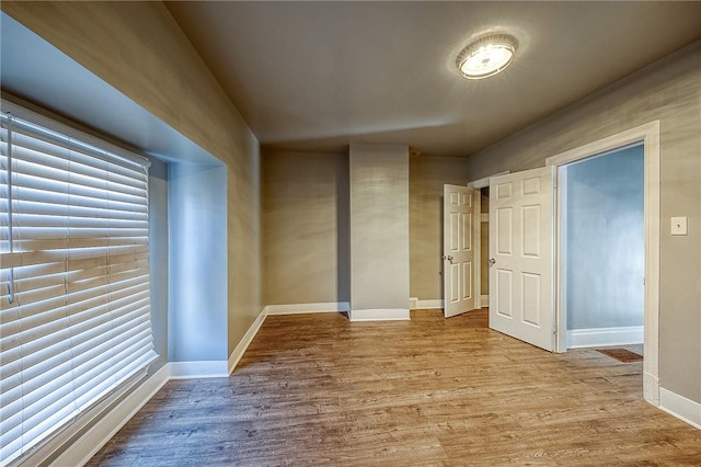 empty room with light wood-type flooring