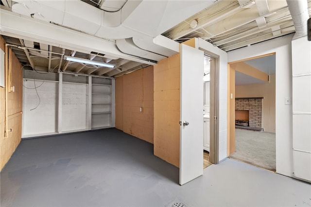 basement featuring a fireplace