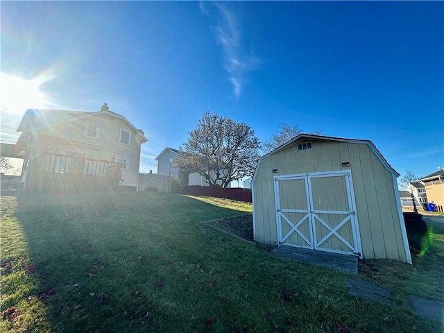 view of outdoor structure with a lawn