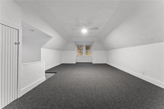 bonus room featuring carpet, ceiling fan, and lofted ceiling