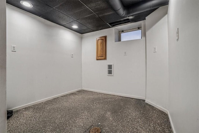 empty room with a drop ceiling