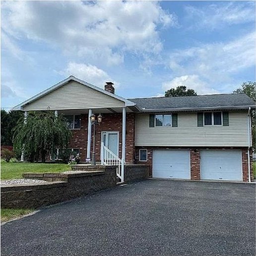 view of front of home with a garage