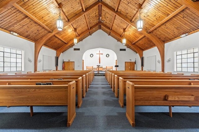 471 New York Ave, Rochester, PA 15074 - miscellaneous room with beam ceiling, high vaulted ceiling, wood ceiling, and dark colored carpet