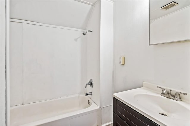 bathroom featuring vanity and washtub / shower combination