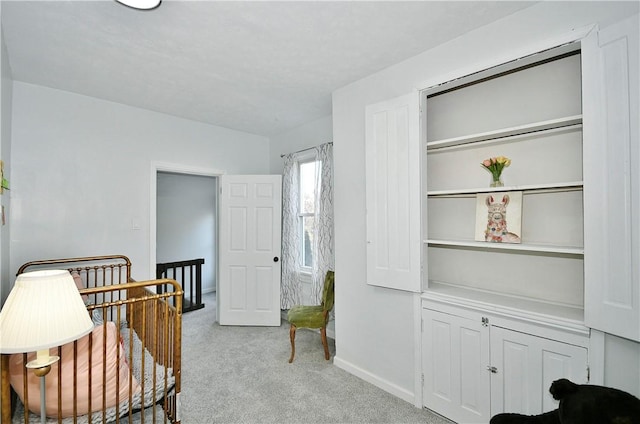 bedroom with light colored carpet