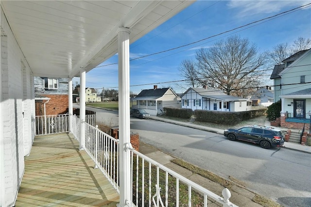 balcony featuring a porch