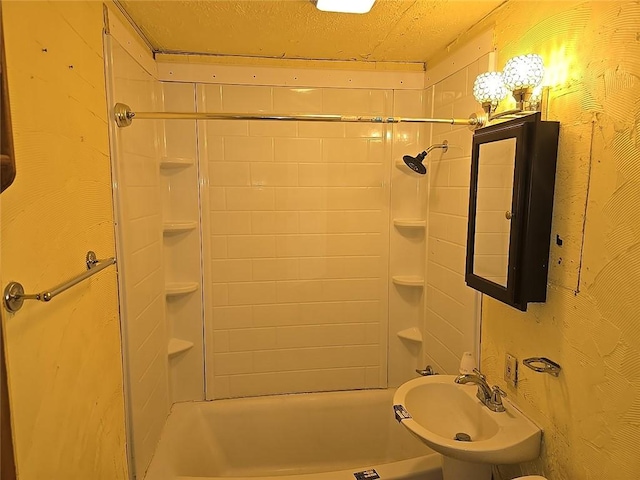 bathroom with sink and  shower combination