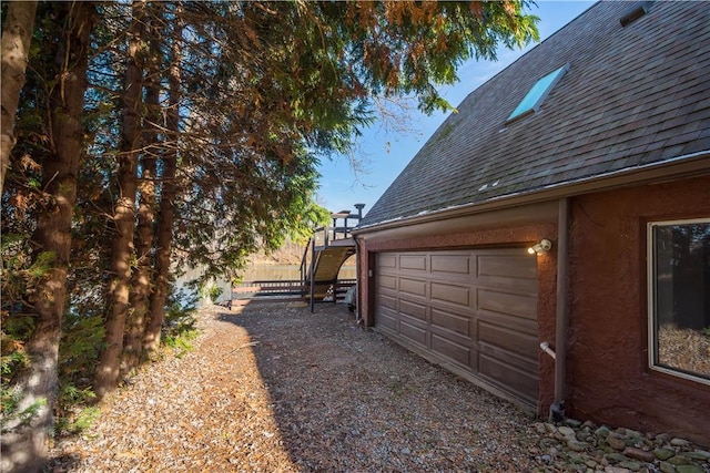 view of yard featuring a garage