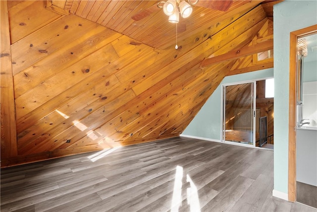 bonus room with ceiling fan, wood ceiling, vaulted ceiling, and hardwood / wood-style flooring