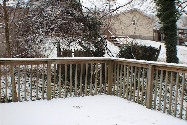 view of snow covered deck