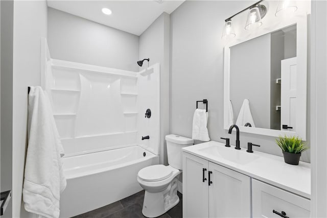 full bathroom with tile patterned flooring, vanity, toilet, and washtub / shower combination