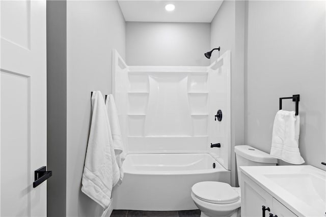 full bathroom with vanity, toilet, and shower / washtub combination